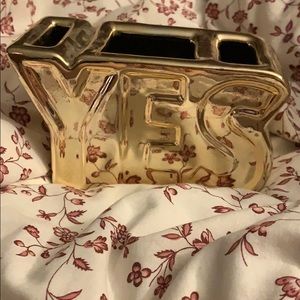 Gold yes brush holder